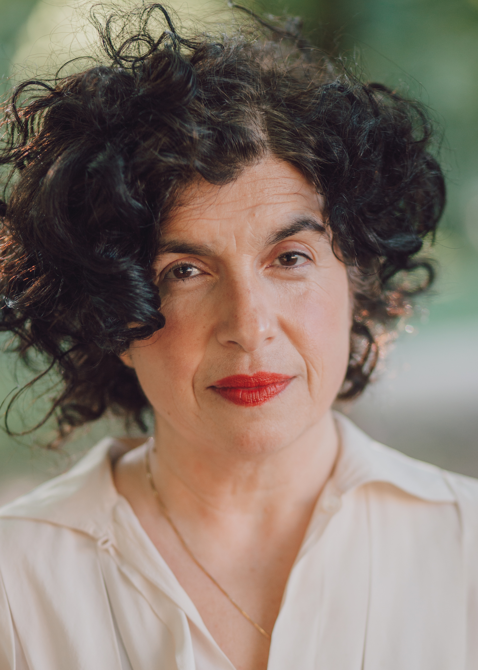 A portrait image of a woman
