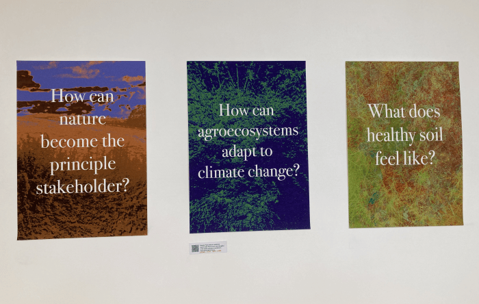 Posters laying text over a background of visualised data